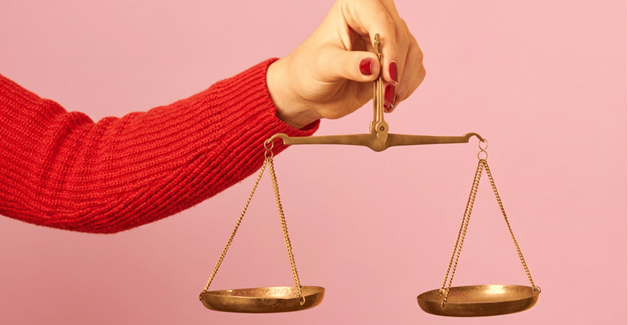 A balance scale in equilibrium, representing the careful comparison and testing of eCommerce order routing strategies before going live.