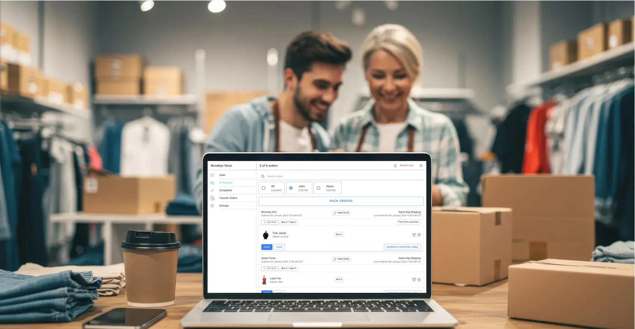 Store fulfillment explained: store associates checking an order on a laptop